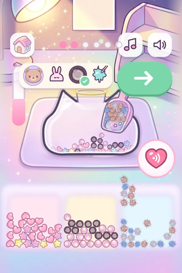 A scoop drops stars, hearts and boba into a clear cat-shaped shell
